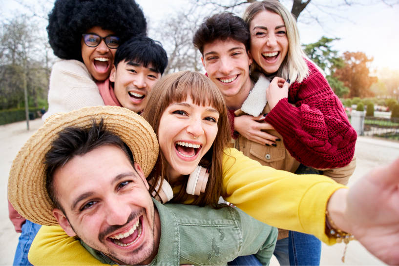 Group of friends taking selfie.